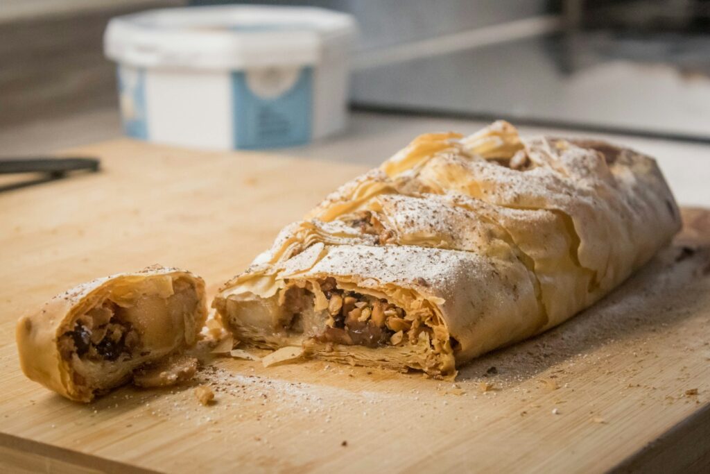 Traditional piece of apple strudel with powdered sugar