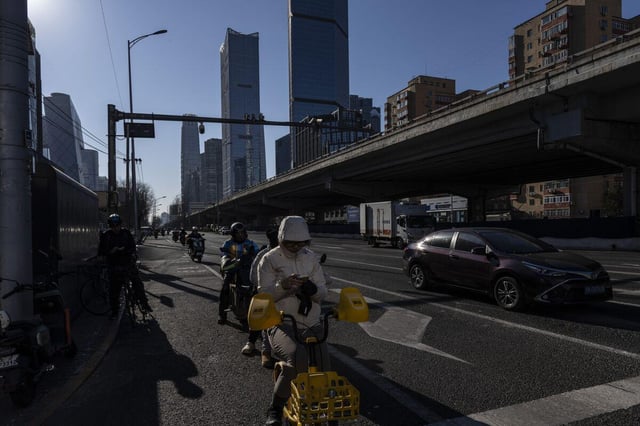 China Sees Record Surge in Currency Exchange as Firms Favor Yuan