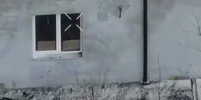 Russian Soldier Seeks Safe Surrender with Cardboard Message